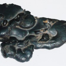 Detail strusky z redukční pece doby železné. Foto: Kamila Dvořáková