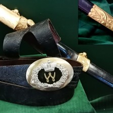 Zdobená pochva a opasek historického loveckého tesáku. Foto: Kamila Dvořáková